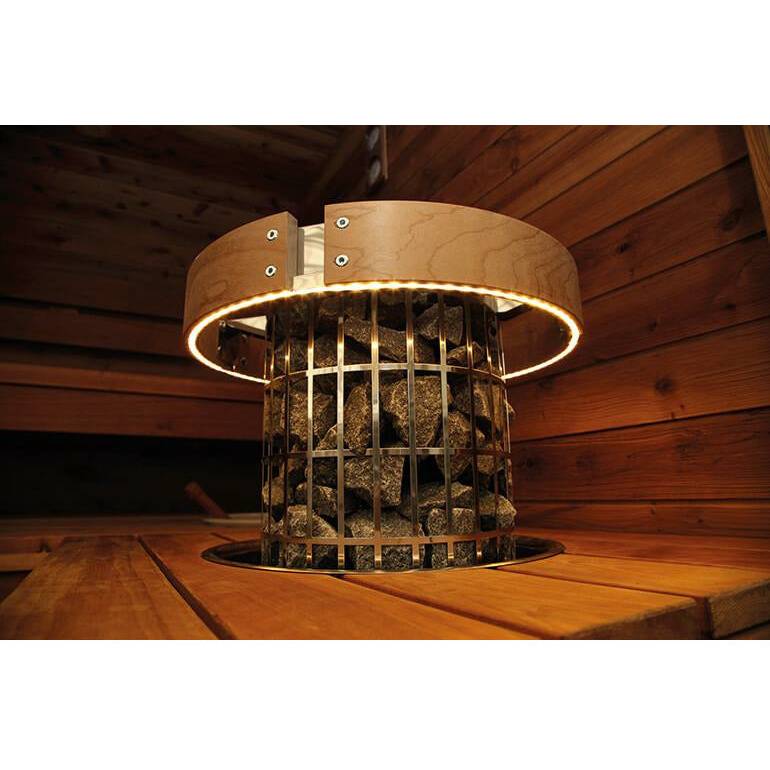 Wooden sauna heater with stone and LED lighting, providing warmth and ambiance.