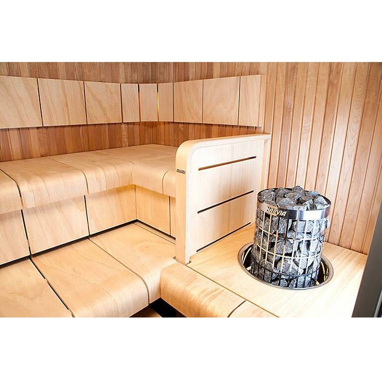 Sauna heater with stone basket in a wooden sauna interior.