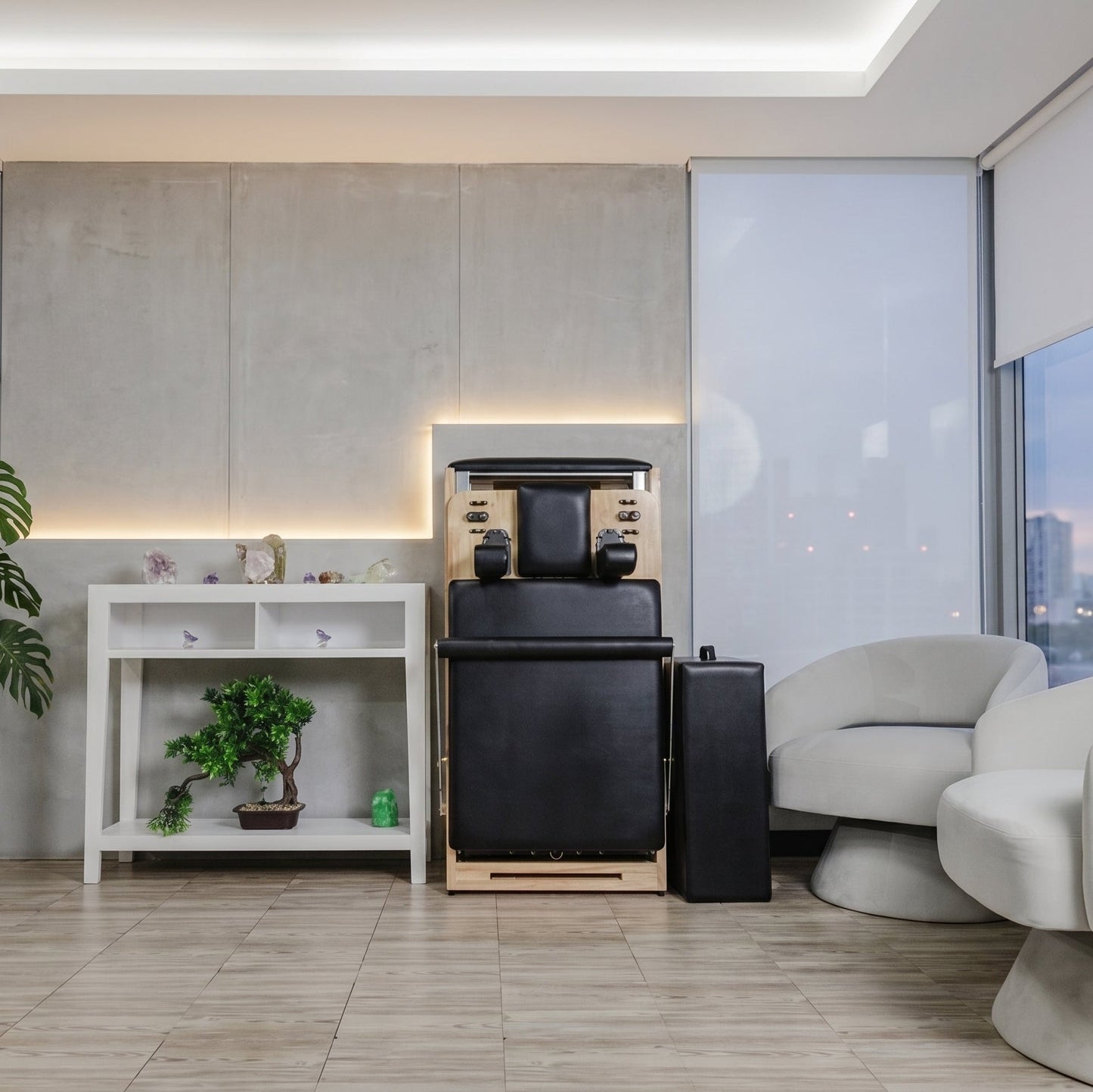 Massage chair in a modern living room setting with a sleek design and neutral colors.