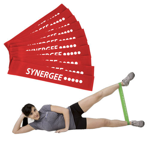 Synergee resistance bands in red with a woman demonstrating leg exercises.