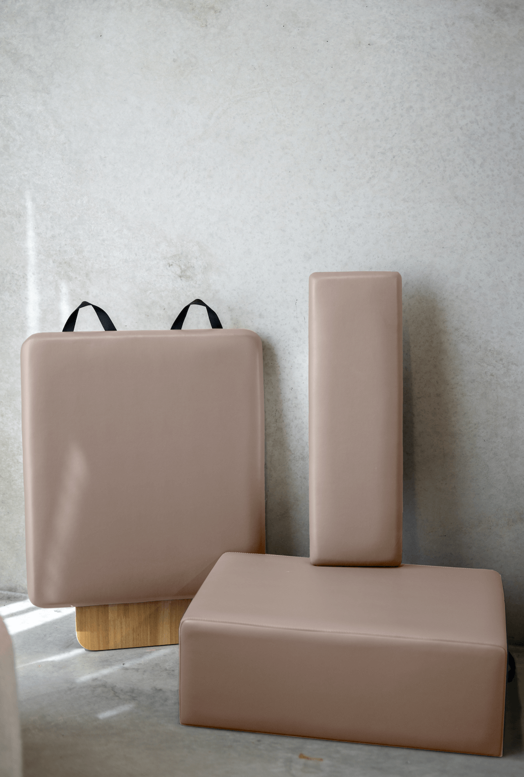 Soft pink exercise mat set featuring various shapes for versatile workouts.