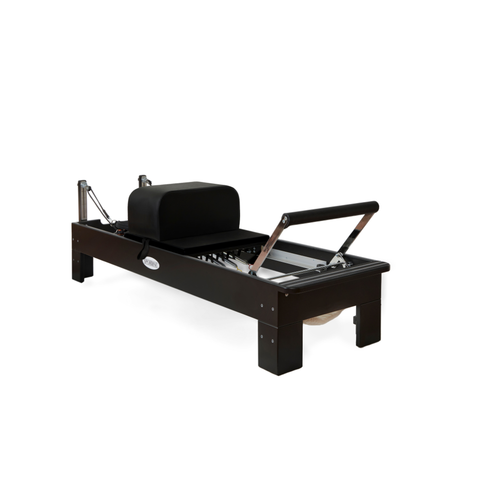 Pilates reformer with a sleek black design and adjustable resistance for effective workouts.