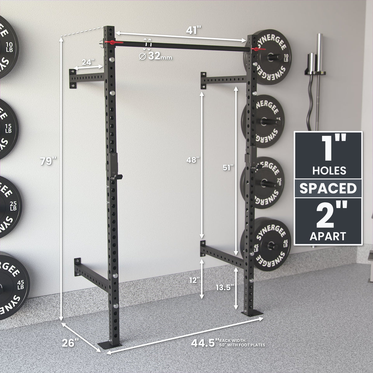 Power Rack with 1-inch holes spaced 2 inches apart, featuring a sturdy black frame and weight plates.