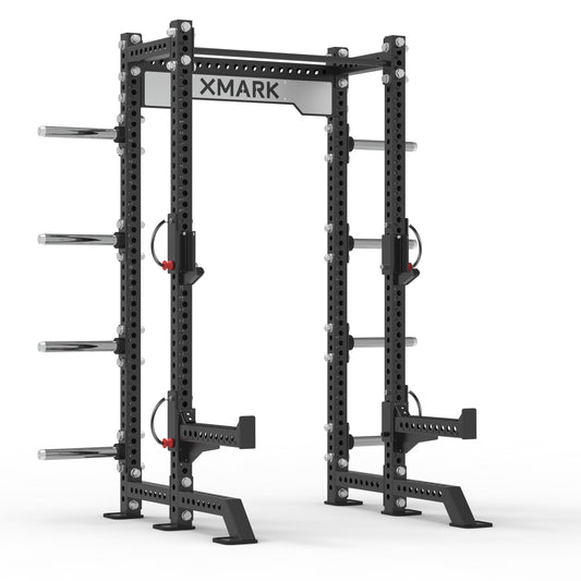 XMark power rack with adjustable safety bars and sturdy frame for strength training.