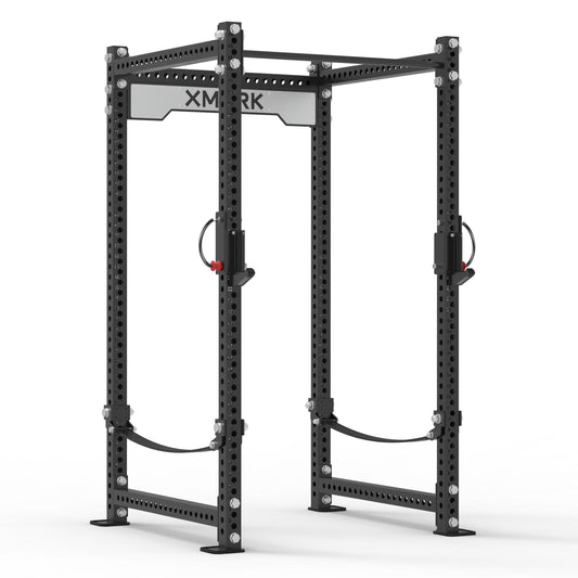 XMark Power Rack with adjustable safety bars and sturdy black frame for strength training.