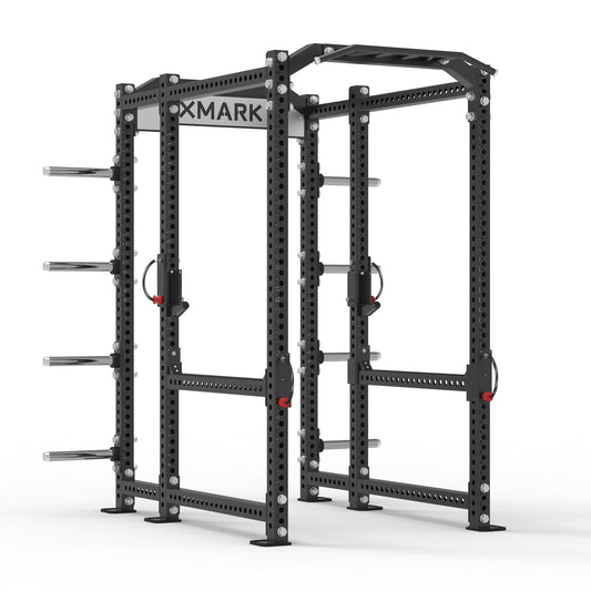 XMark power rack with adjustable pull-up bar and multiple weight plate holders.