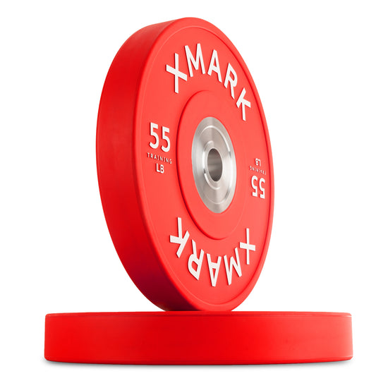 XMark 55 lb red bumper plate with silver center for weightlifting.