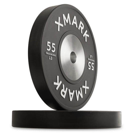 XMark 55 lb rubber weight plate with a sleek black design and silver center.