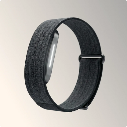 Fitness Tracker Band features a sleek black fabric design for comfort and style.